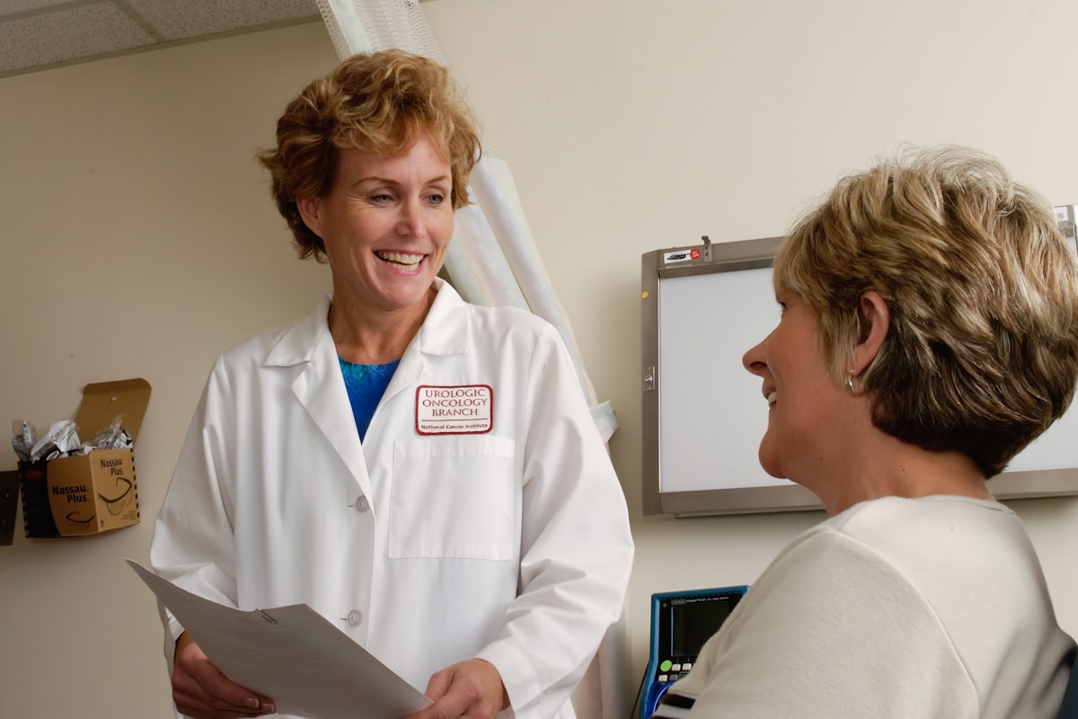 Clinician reviewing notes with a virtual scribe